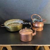 A mixed collection of copper and brass items to include a coal scuttle, a teapot and a pan. Dia.35cm