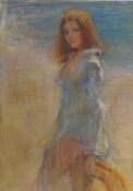 A large framed and glazed pastel study of a girl walking on a beach, indistinctly signed. H.99 W.