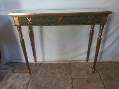 A contemporary Louis XVI style moulded gilt console table with glass top. H.83 W.95 D.35