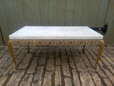 A marble and gilt metal coffee table in the French 19th century style having a thick rectangular top