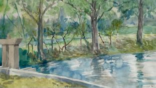 A contemporary watercolour depicting a pond in a woodland garden, signed John Greenwood and dated