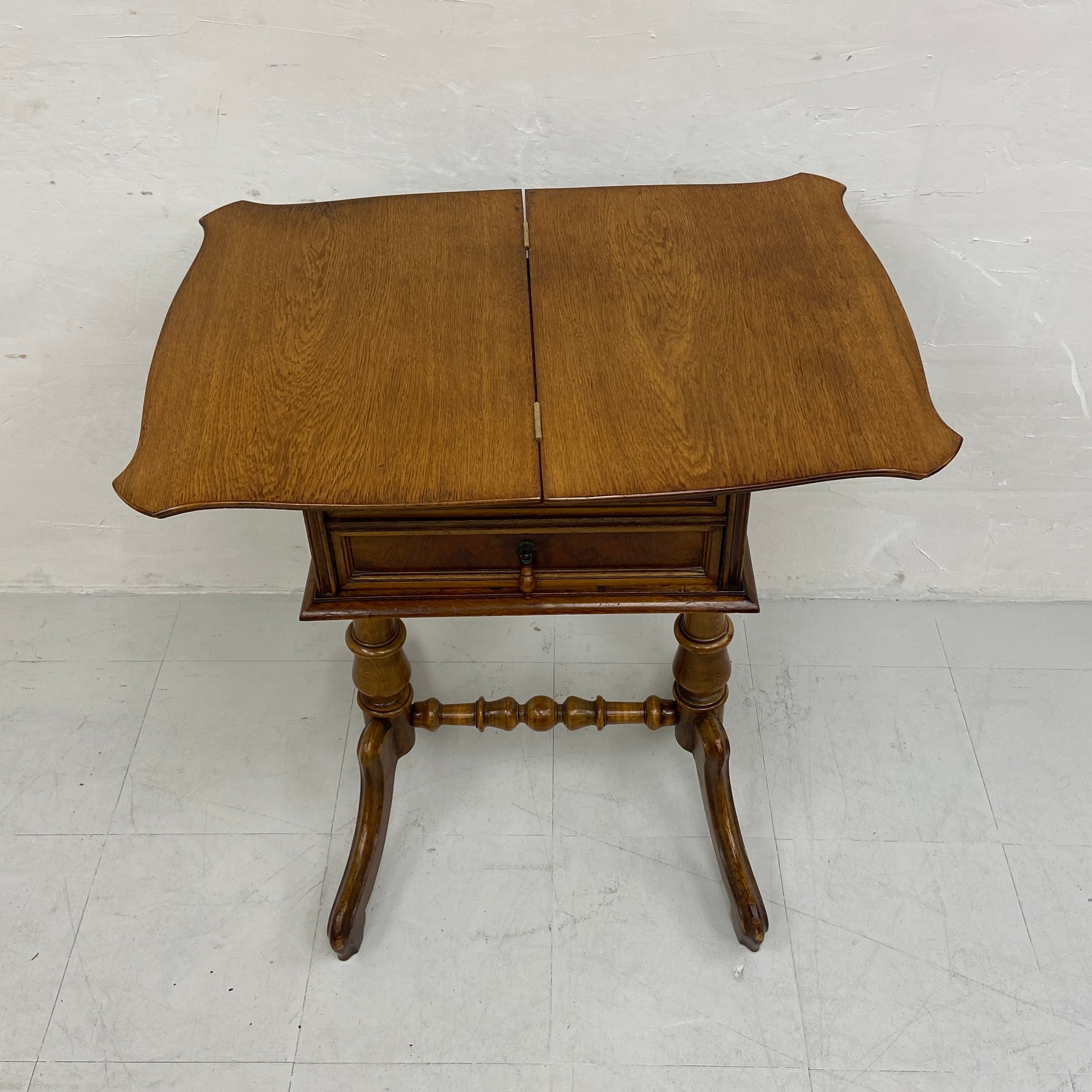 A 19th century Continental walnut side or work table having a book-matched and crossbanded revolving - Image 7 of 7