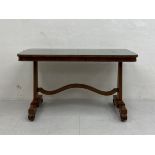 A William IV rosewood side or library centre table having a rectangular top fitted with a piece of