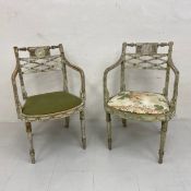 A pair of Regency painted armchairs each having a carved back with central Neoclassical figural