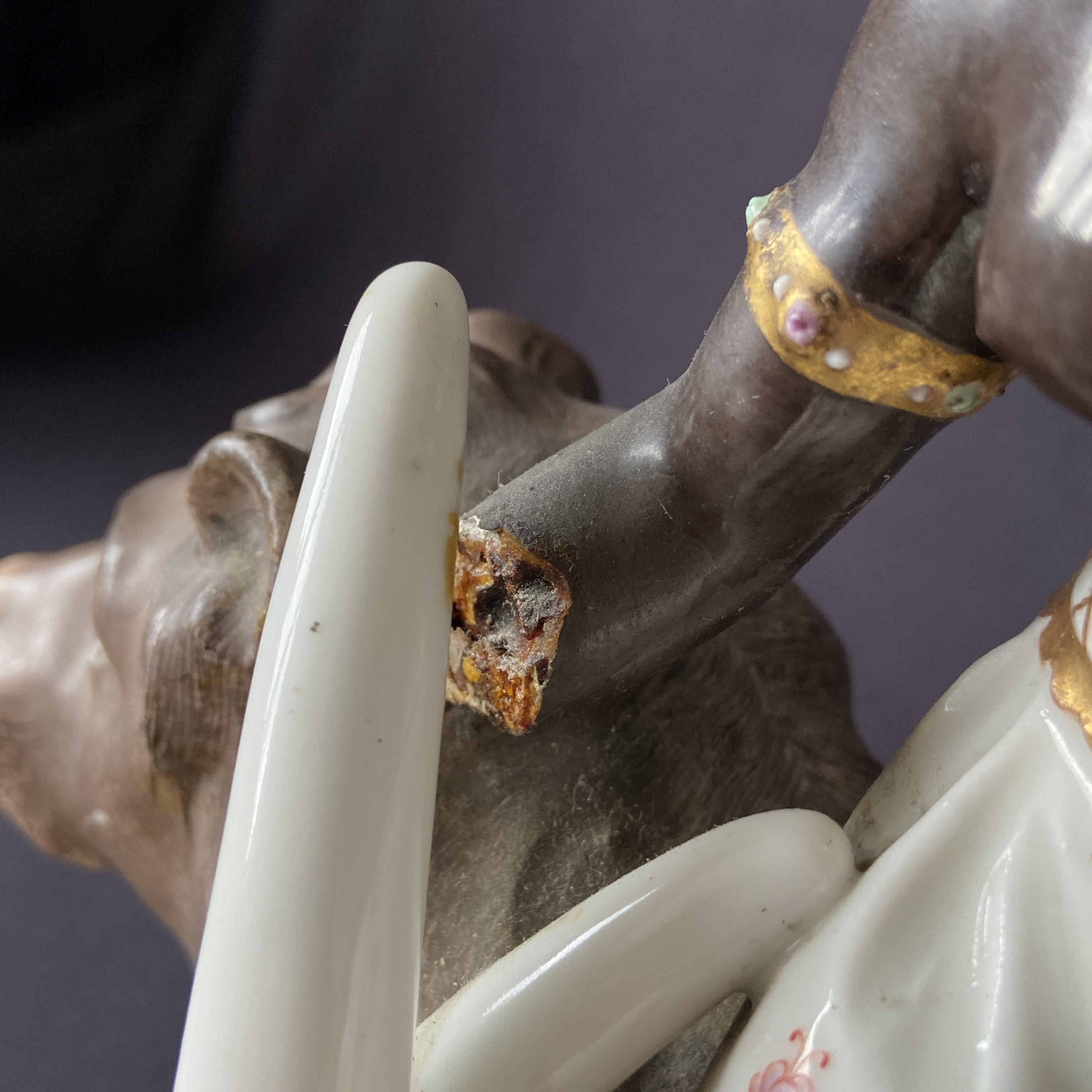 An 18th century hand painted European porcelain allegory of Africa depicting a blackamoor figure on - Image 3 of 7