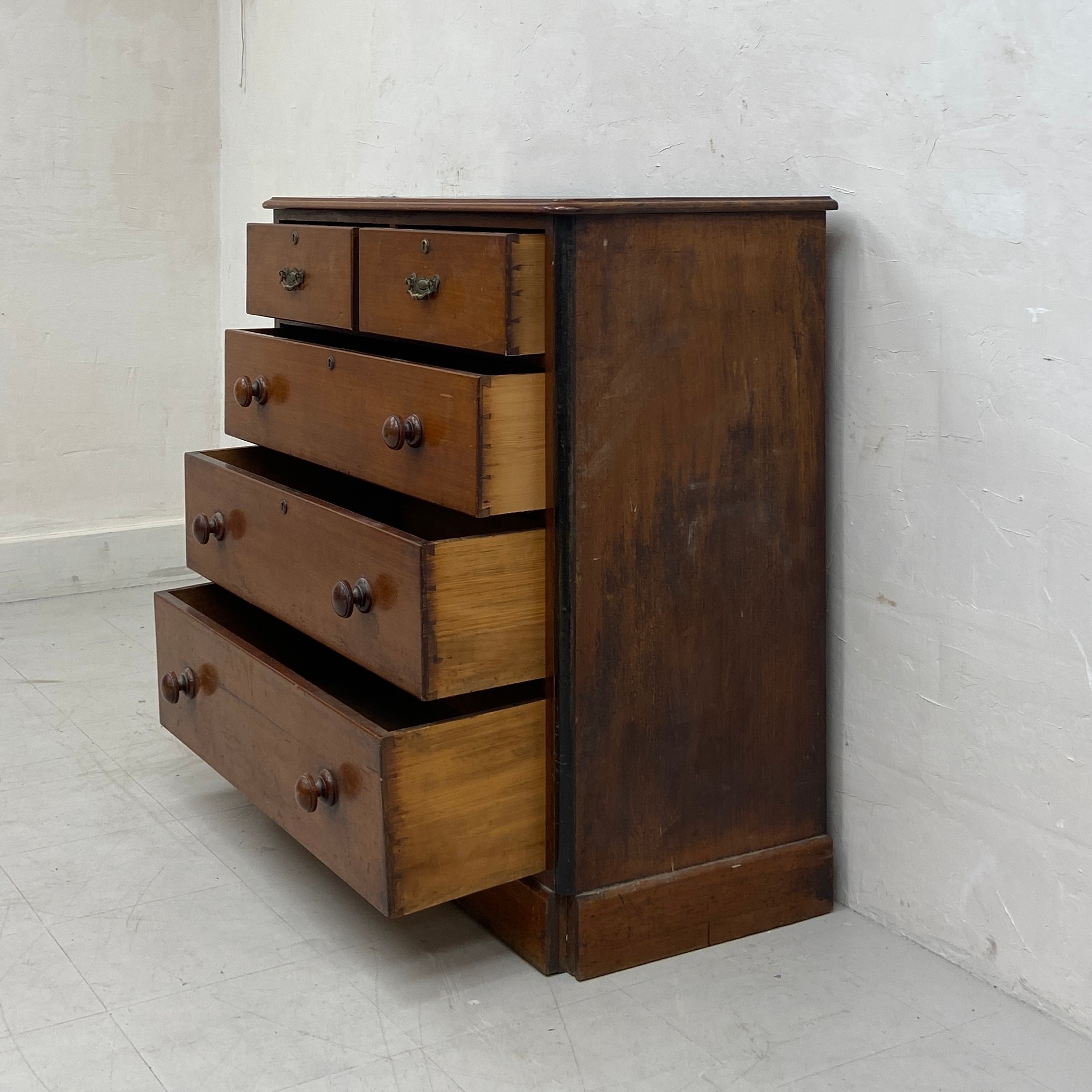 A 19th century walnut chest of two short over three long graduating drawers with turned handles - Image 4 of 5