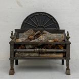 A 19th century Regency style steel fire grate. H.65 W.60 D.28cm
