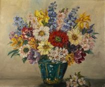 A 20th century oil on board, still life flowers, in a gilt frame. H.64 W.74cm