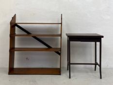 A C.1900 open pine bookshelf along with a mahogany card table with revolving action and baize