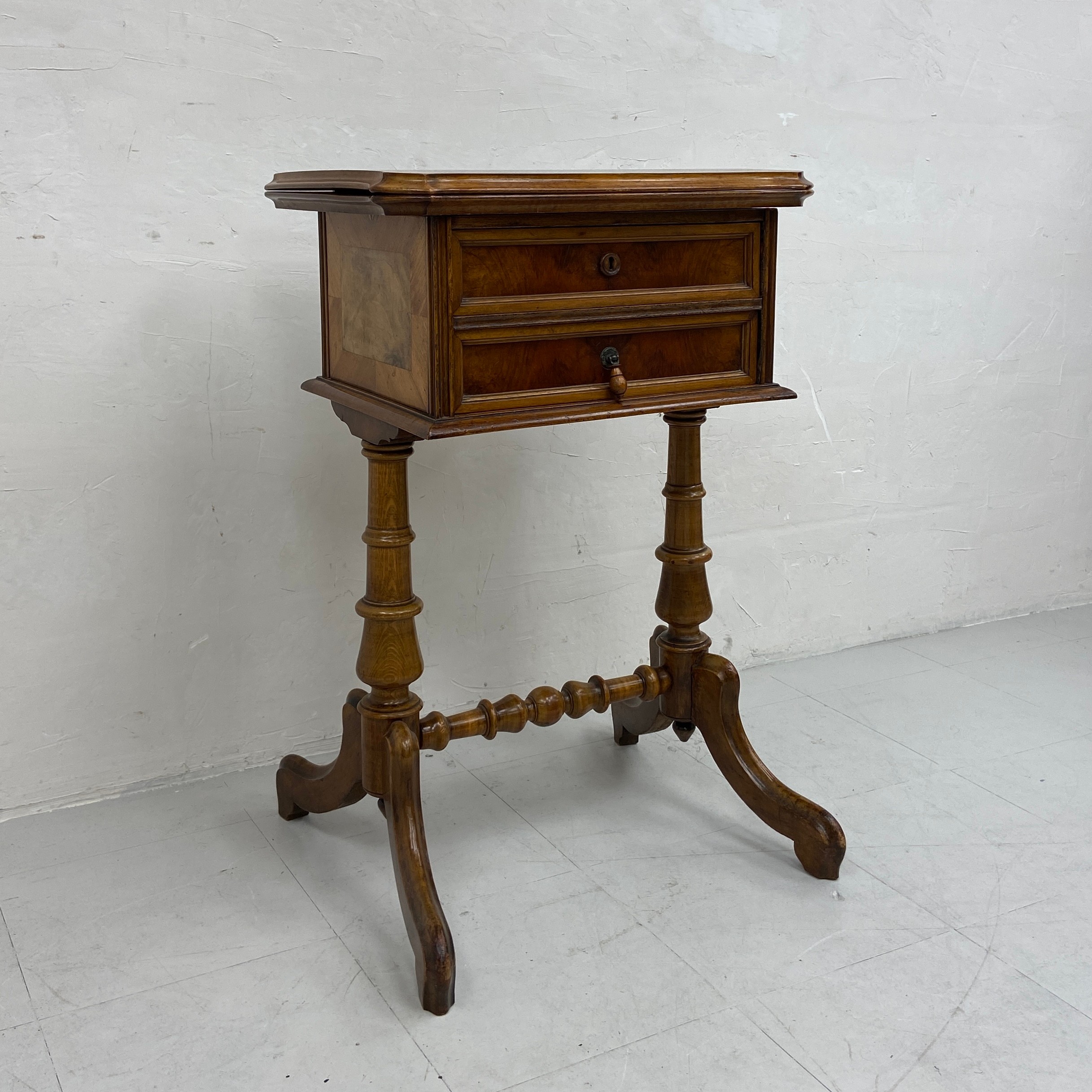 A 19th century Continental walnut side or work table having a book-matched and crossbanded revolving - Image 2 of 7