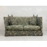 A vintage Victorian style Knoll drop arm two seater sofa having a square back and arms over a deep