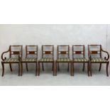 A set of six Regency style mahogany dining elbow chairs each having a carved barley-twist top rail