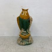 A large floor standing Chinese Tang style sancai glazed ceramic Koi fish vase. H.86cm
