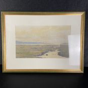 A 20th century watercolour depicting figures on an estuary in an expansive landscape, framed and