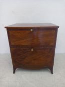 A Georgian mahogany cabinet having a rectangular top with a satinwood strung edge over two marquetry