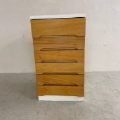 A mid century beech and painted narrow chest of drawers. H.91 W.50 D.54cm