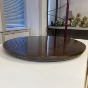 A large 19th century Anglo-Indian padouk wood Lazy Susan with a revolving action. Dia.68cm