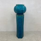 A C.1900 century Burmantofts style teal glazed terracotta jardiniere in two parts having a