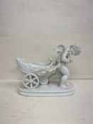 A 19th century Blanc de Chine figure group or bob-bon dish, cherub pulling a carriage with