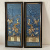 A pair of possibly 19th century Chinese embroideries on silk each having a central five-clawed