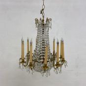 A vintage ten branch cut crystal chandelier of basket form with scrolling gilt metal arms. Dia.