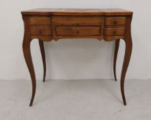 A 19th century French Louis XVI style poudreuse or dressing table with hinged top, central rising