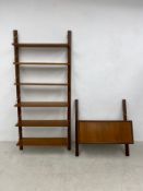 A mid century Danish teak floating desk and modular wall shelves. 193x87cm
