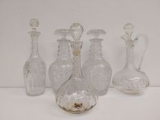 A pair of Georgian mallet form cut glass decanters with original stoppers along with three 19th