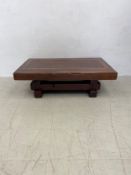 A contemporary teak coffee table in two sections. 36x120x75cm