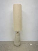 A contemporary ceramic floor standing lamp by Ferm Living. H.139cm.