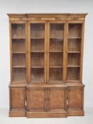 A Georgian style walnut breakfront library bookcase of compact size by Morganton. H.197 W.153 D.39cm