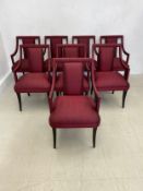 A set of eight Munna Corset dining armchairs in faux snakeskin upholstery with maker's label. H.94cm