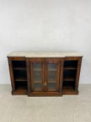 A William IV rosewood dwarf breakfront library bookcase with marble top above glazed cabinet and
