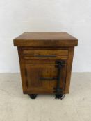 A contemporary teak and iron mounted side or bedside cabinet. 60x46x42cm
