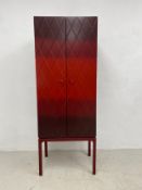 A contemporary Luisa Peixoto painted and lacquered cabinet on stand with maker's label. 163x61x40cm