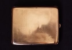 A gold cigarette case of curved outline with engraved pattern across both sides, maker's mark Joseph