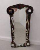 A large vintage wall mirror having a long central shaped plate in an ornately mosaicked frame with
