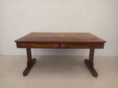 A Regency rosewood library or centre table fitted with frieze drawer. H.69 W.136 D.81cm (Small