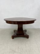 A mid 19th century centre table or breakfast table. (An extending dining table with leaves