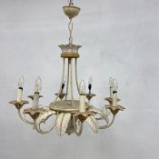 A painted metal 19th century style eight branch chandelier with scrolling acanthus leaf