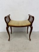 An Edwardian mahogany piano stool or window seat on cabriole supports. 67x63x39cm