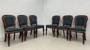A set of six 19th century mahogany dining chairs each having a shaped back with chenille upholstered