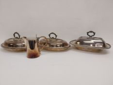 A pair of silver plated lidded tureens along with another similar and a milk jug. H.15 W.30 D.22.5cm
