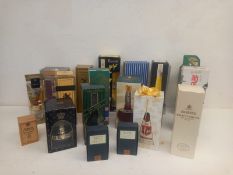 A mixed collection of sixteen boxed bottles of spirits, liqueurs and others to include Galliano,