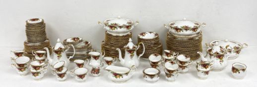 A large Royal Albert Old Country Roses pattern part china dinner service to include three lidded