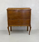 A 19th century Scandinavian pale birch escritoire with fall front revealing a fitted interior