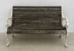 A C.1900 cast iron garden bench with weathered teak slats. H.82 W.127 D.60cm