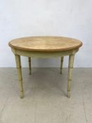 A vintage faux bamboo extending dining table. (Missing leaves). H.76 x Dia.102cm