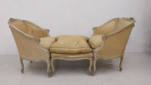 A late 19th century carved and painted Duchesse Brisee chaise formed of a matching pair of