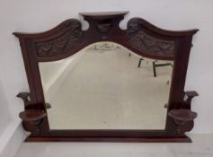 A late 19th century carved walnut overmantel mirror. H.93 W.130 D.15cm